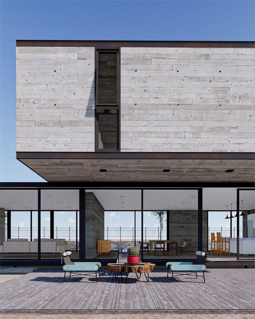 Render de Arquitectura de Casa moderna de dos plantas con exterior de concreto, diseñada por Estudio de Arquitectos en Guadalajara. La planta baja cuenta con paredes de cristal que revelan un interior amueblado e iluminado. La terraza exterior tiene espacio para sillones y mesa de café. Cielo azul claro en el fondo.